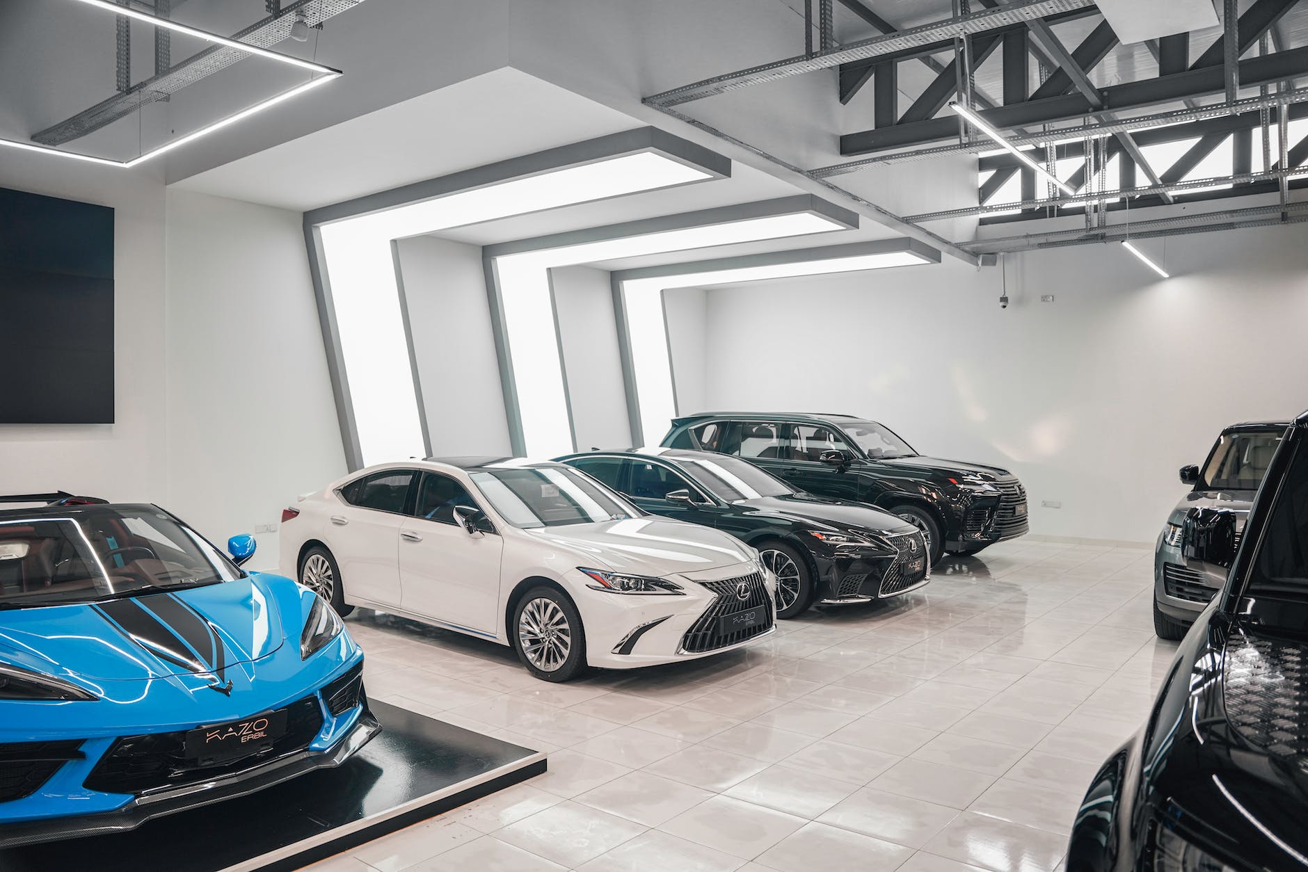modern expensive cars in the garage